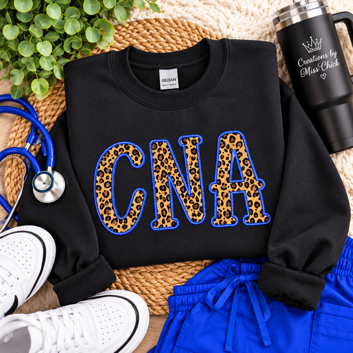 Black CNA leopard applique sweatshirt boutique flat lay
