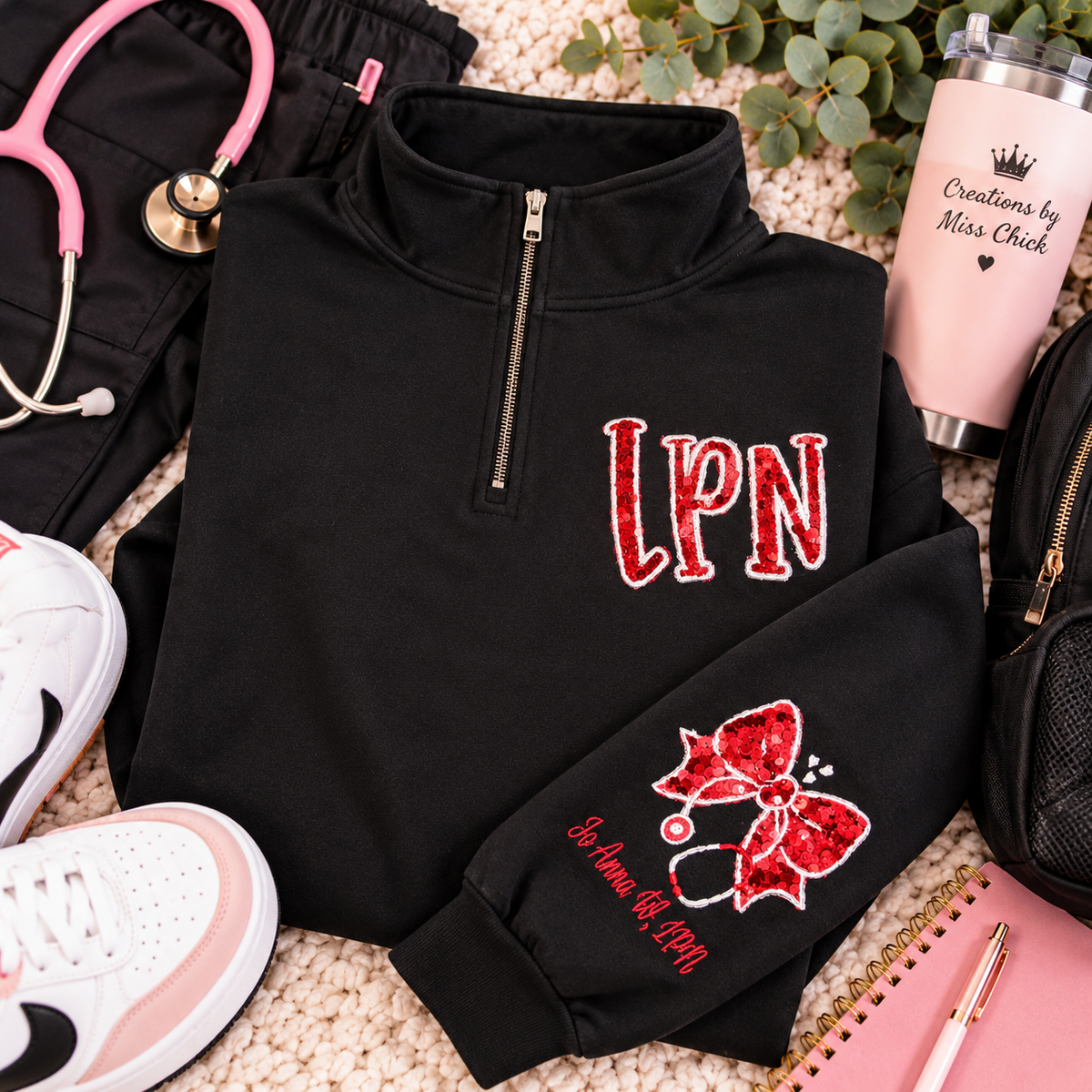 LPN black quarter zip red sequin appliqué boutique flat lay